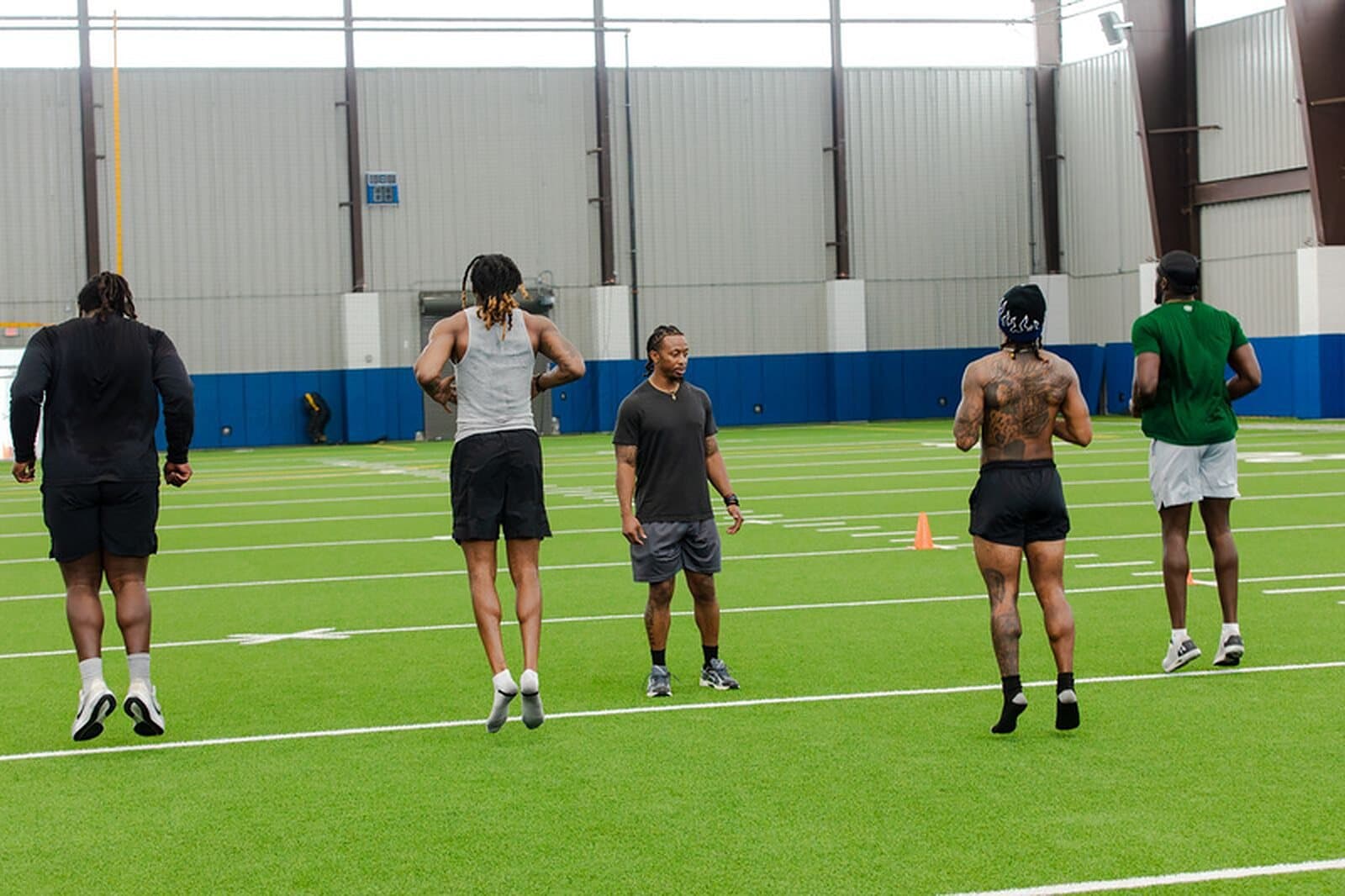 A group of athletes training together on the field